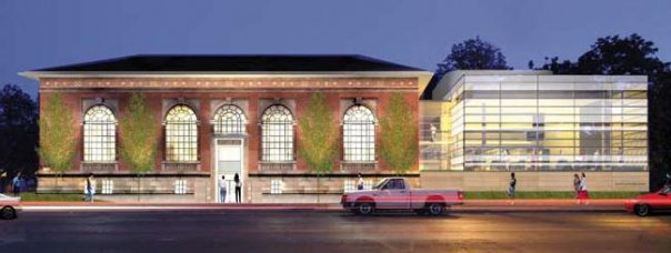 Old, symmetrical one-storey building alongside clear glass prism
