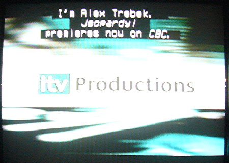 Centred caption reads I'm Alex Trebek. Jeopardy! premieres now on CBC.
