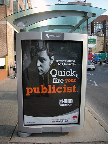 Billboard on bus shelter shows Strombo and reads Haven’t talked to George? Quick, fire your publicist.