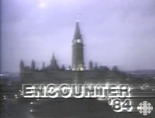 ENCOUNTER ’84 Chyron over image of Parliament Buildings