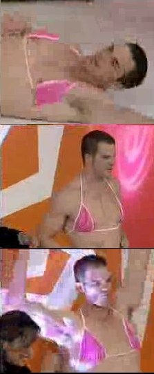 Ian Roberts in pink bra and undershorts (lying on floor, standing, flexing astronomically gargantuan arms)