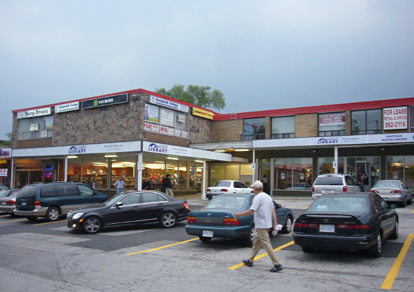 Library branch sits inside bumped-out corner of strip mall