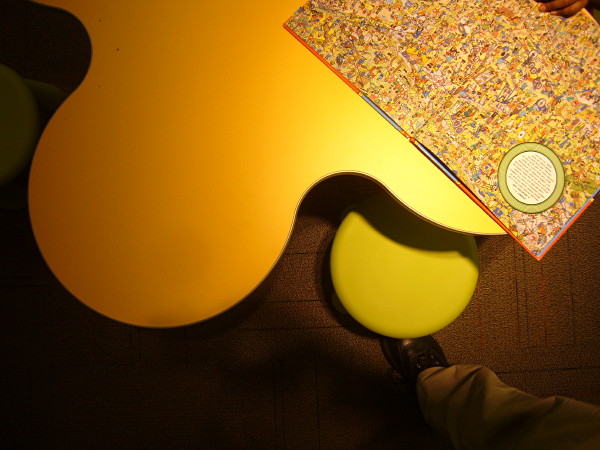 Textured surfaces on rounded, three-leaf-clover-shaped tabletop