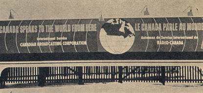 Old billboard shows a globe featuring only Canada radiating sound waves: CANADA SPEAKS TO THE WORLD FROM HERE