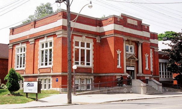 Red brick building with white trim