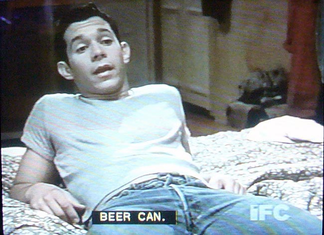Beer can, says Pitoc, leaning back on a bed