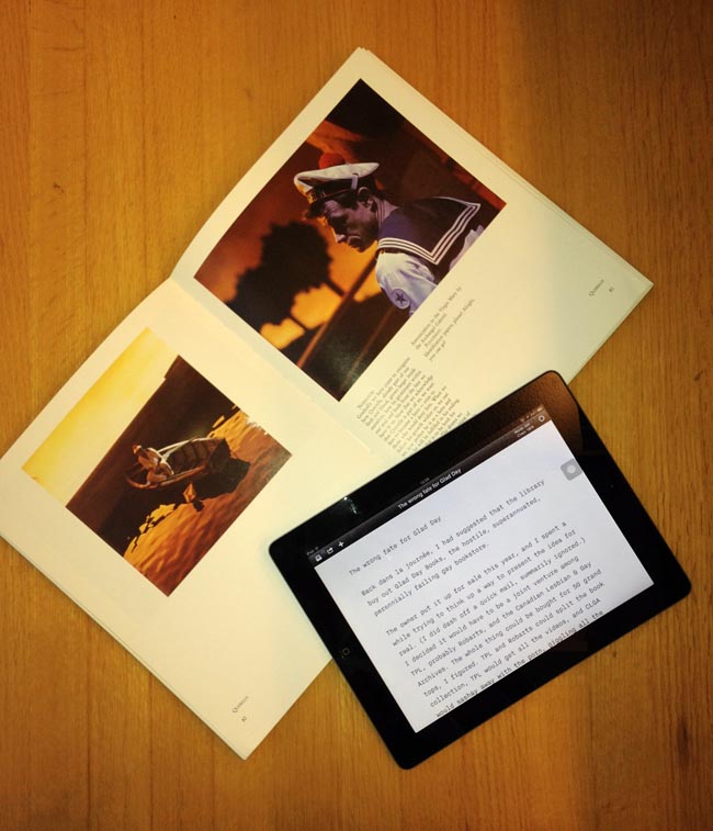 Spread from ‘Querelle: The Film Book,’ featuring Brad Davis in a sailor suit, and this article on an iPad
