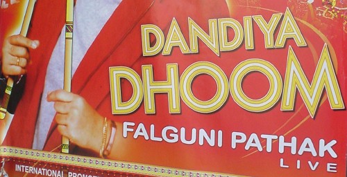 Lettering on sign reads DANDIYA DHOOM and also FALGUNI PATHAK in Arial Narrow 