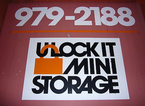 Sign has phone number and ULOCKIT MINI STORAGE in Avant Garde Gothic with custom ligatures