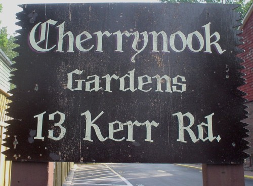 Sign reads Cherrynook Gardens 13 Kerr Road in hand-drawn blackletter
