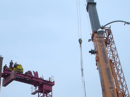 Crane on right side, platform of stationary crane on left