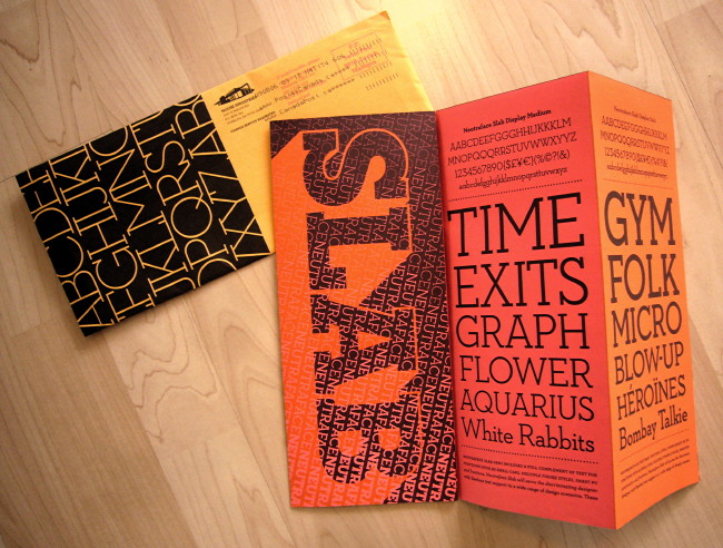 Orange-and-peach folded flyer with type samples; brown envelope with white-on-black typeface sample in corner