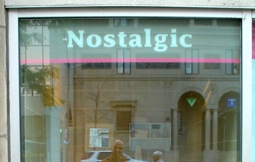 Sign behind store window reads ‘Nostalgic’ in Lucida Fax