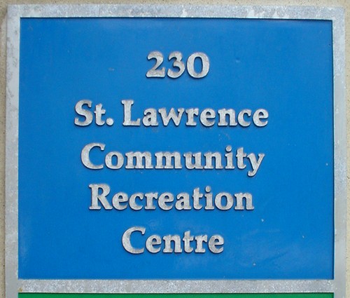 Metal Palatino letters on blue ground read ‘230 St. Lawrence Community Recreation Centre’