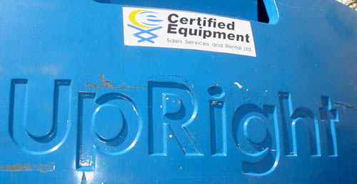 Embossed logo on crane reads UpRight in sansserif font