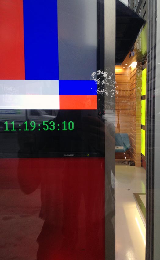Test pattern viewed through window has timecode below it reading 11:19:53:10