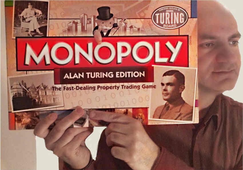 Me holding Alan Turing Monopoly set