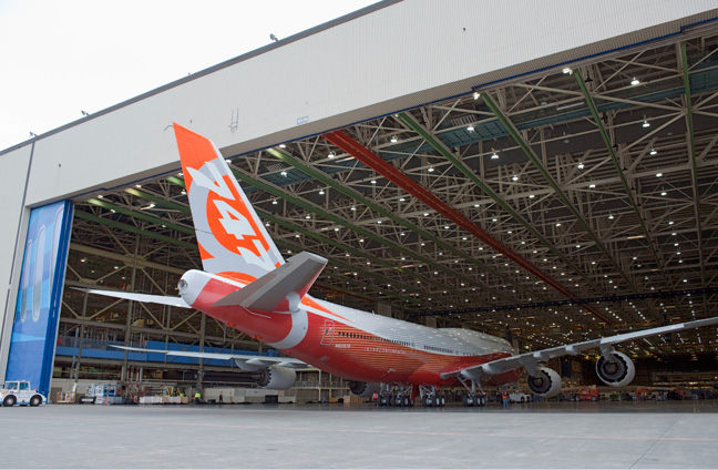 Photo: Orange 747-8I barely inside hangar