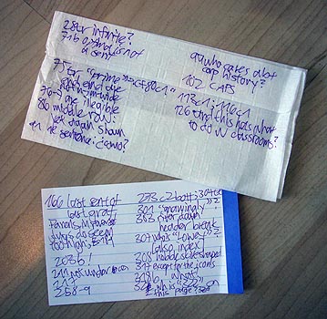 Handwritten notes on napkin and index card