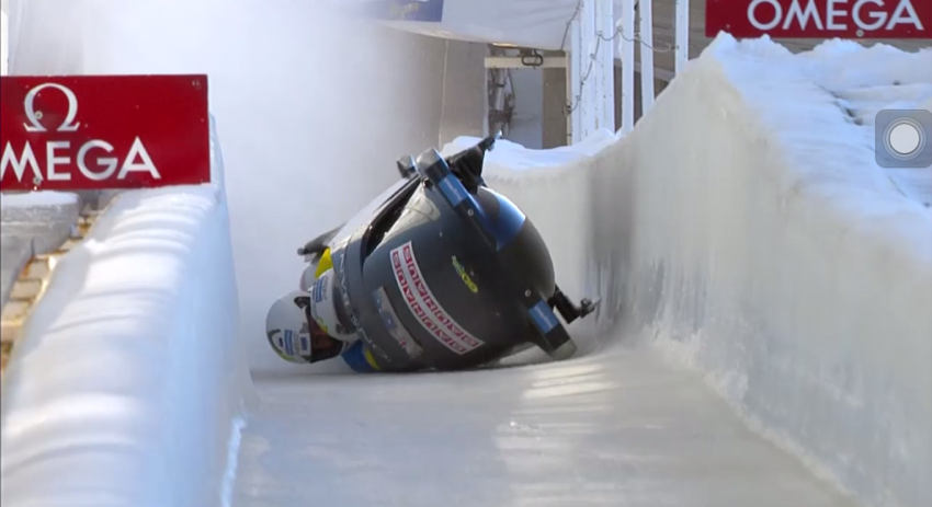 Bobsled on its side on track