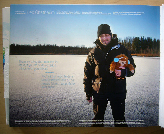 Leo Obstabaum holding mascot out in the snow